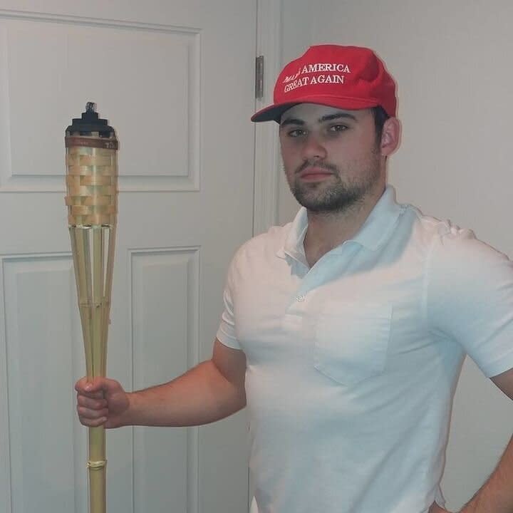 James Allsup uploaded a photo to Facebook in which he holds a tiki torch like the ones used during the “Unite the Right” rally.  (Photo: Facebook)