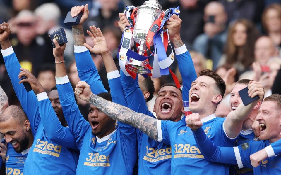 James Tavernier holds the trophy aloft during the Scottish Cup Final match between Rangers and Heart of Midlothian at Hampden Park - Ian MacNicol/Getty Images