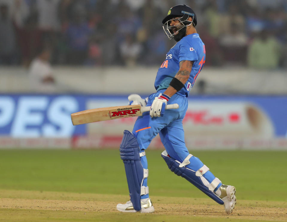 India's captain Virat Kohli celebrates their win against West Indies during their first Twenty20 international cricket match in Hyderabad, India, Friday, Dec. 6, 2019. (AP Photo/Mahesh Kumar A.)