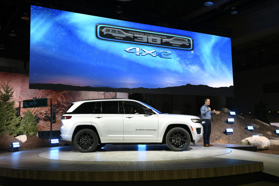 Jim Morrison, Head of Jeep Brand North America, introduces the audience to the Jeep Grand Cherokee 4XE 30th Anniversary Edition at the North American International Auto Show, Wednesday, Sept. 14, 2022, in Detroit. (AP Photo/Jose Juarez)