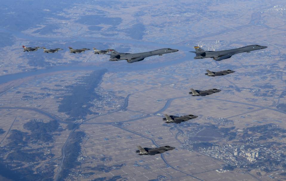 FILE - In this photo provided by South Korean Defense Ministry, two U.S. Air Force B-1B bombers, top center, four South Korean Air Force F-35 fighter jets and four US Air Force F-16 fighter jets fly over South Korea Peninsula during a joint air drill called "Vigilant Storm," in South Korea on Nov. 5, 2022. (South Korean Defense Ministry via AP, File)