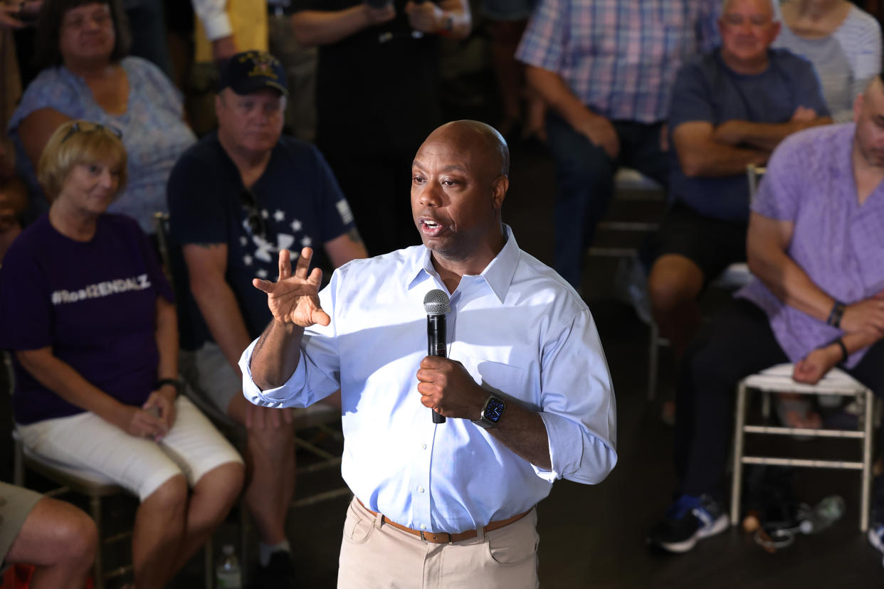 Sen. Tim Scott, R-S.C., speaks at a town hall meeting in Ankeny, Iowa.