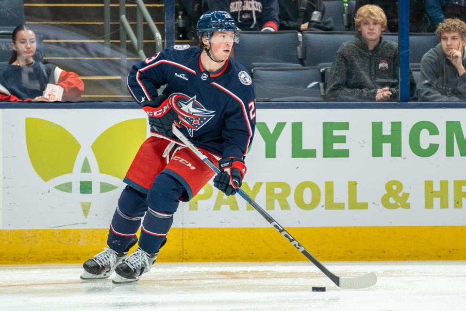 Oct. 5, 2023; Columbus, Ohio, United States;
Columbus Blue Jackets defenseman Jake Christiansen (23) looks for an open teammate to pass to during their game against the Washington Capitals on Thursday, Oct. 5, 2023 at Nationwide Arena.