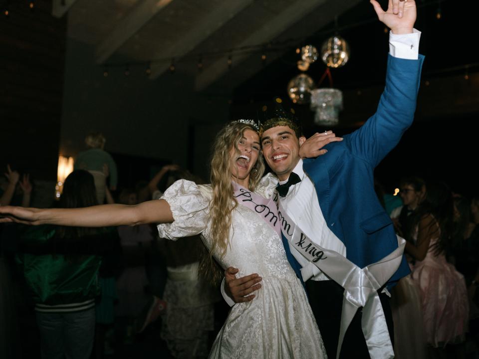 A bride and groom looking very happy.