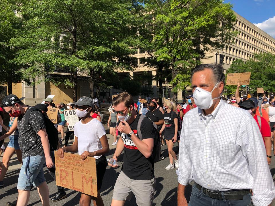 WASHINGTON, DC - JUNE 07: Sen.Mitt Romney (R-Utah) marches with a crowd singing Little Light of Mine on June 7, 2020 in Washington D.C. (Photo by Michelle Boorstein/The Washington Post via Getty Images)