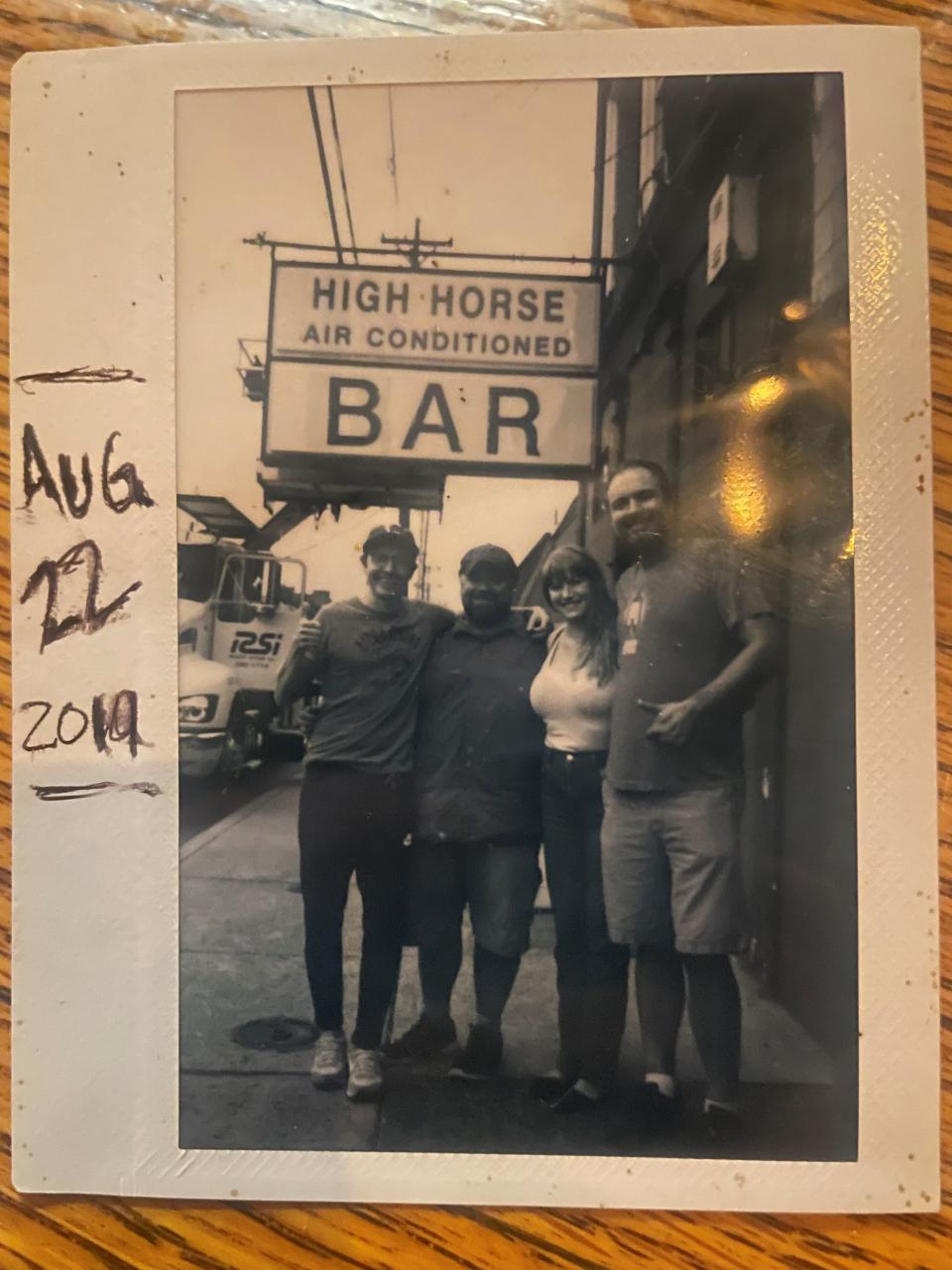 A polaroid photo of the main four owners of High Horse Bar, including the late Marie Zahn.