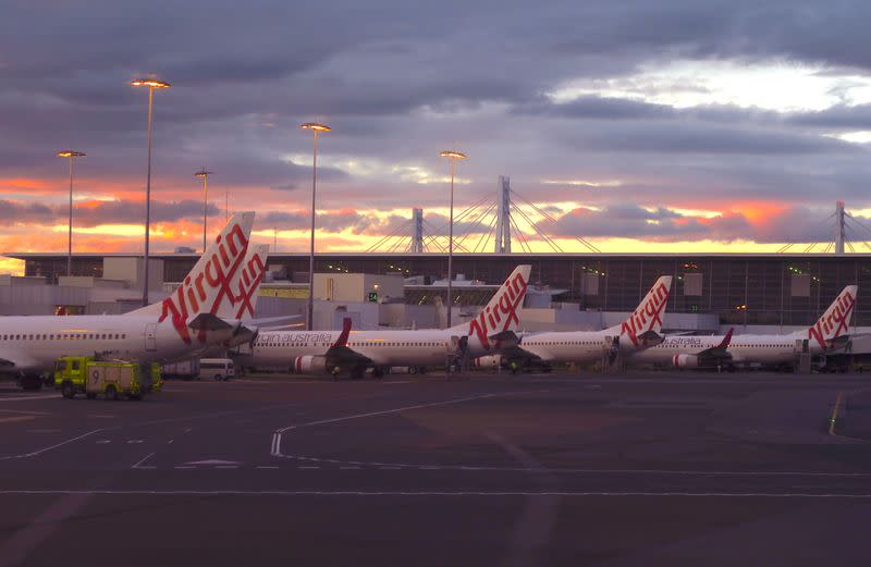 Aircraft from Australia's second largest airline, Virgin Australia, sit on the tarmac at the domestic terminal of Sydney Airport