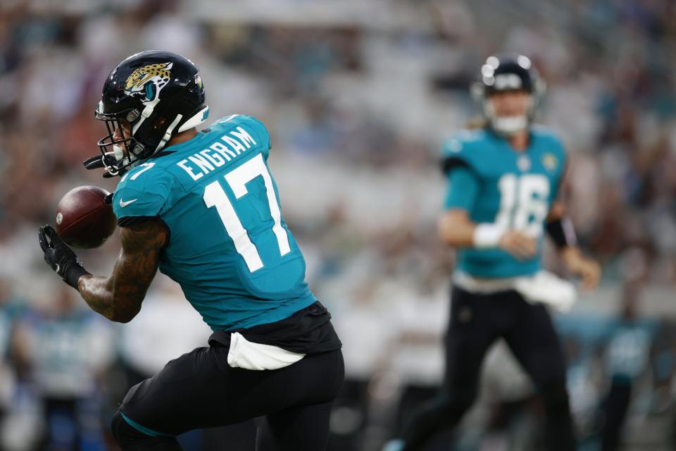 Jaguars tight end Evan Engram (17) goes into the end zone after catching a pass from Trevor Lawrence (16) during the second quarter of Friday's preseason game against the Cleveland Browns.