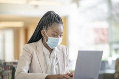 <span class="caption">Some patients may be charged for telehealth sessions they thought were free.</span> <span class="attribution"><a class="link " href="https://www.gettyimages.com/detail/photo/young-african-american-woman-with-a-mask-at-work-royalty-free-image/1253388484?adppopup=true" rel="nofollow noopener" target="_blank" data-ylk="slk:FatCamera/GettyImages;elm:context_link;itc:0;sec:content-canvas">FatCamera/GettyImages</a></span>