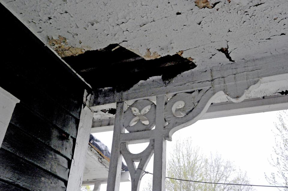 The porch roof at the Compton House is falling apart.
