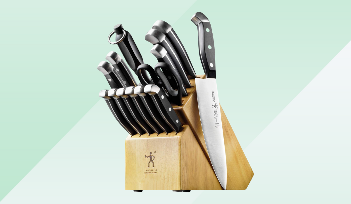 the henckels knife set against a green background