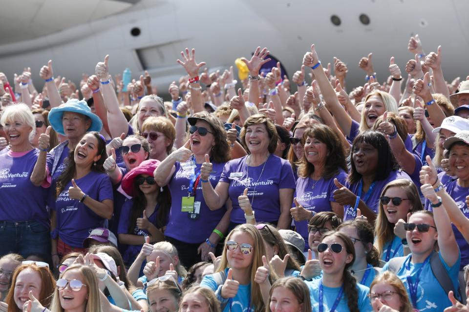 Members of EAA WomenVenture pose for the annual group photo at EAA AirVenture on Wednesday, July 24, 2019, at Wittman Regional Airport in Oshkosh, Wis.