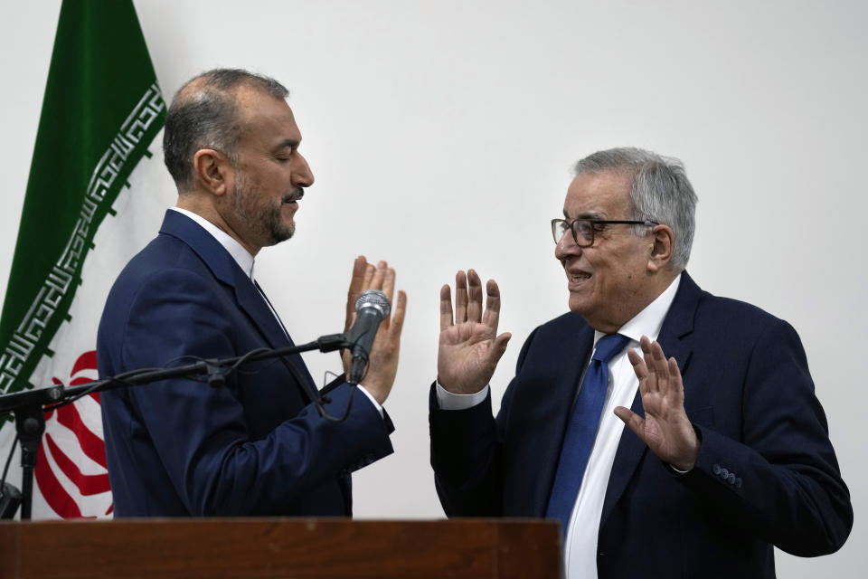 Iranian Foreign Minister Hossein Amirabdollahian, left, speaks with his Lebanese counterpart Abdallah Bouhabib during a joint press conference in Beirut, Lebanon, Friday, Jan. 13, 2023. Amirabdollahian said talks between regional rivals Iran and Saudi Arabia are continuing and could eventually restore diplomatic relations that were severed years ago. (AP Photo/Bilal Hussein)