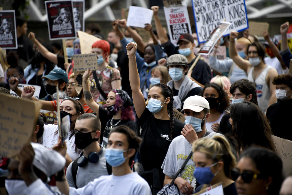 People march during a protest in London, Saturday, July 11, 2020, organised by Black Lives Matter, in the wake of the killing of George Floyd by police officers in Minneapolis, USA last month. (AP Photo/Alberto Pezzali)