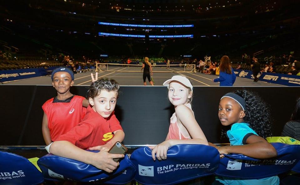 From left to right, John Henry Mills, Sebastian Astorga, Julia Wojtowicz (at age 10) and Chantajah Mills, the lookalikes for tennis stars Carolina Wozniacki, Serena Williams, Stan Wawrinka and Gael Monfils in a World Tennis Day event at Madison Square Garden in 2016.