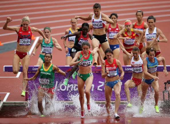 Clarisse Cruz of Portugal (C) competes in the Women's 3000m Steeplechase Round 1 Heats on Day 8 of the London 2012 Olympic Games at Olympic Stadium on August 4, 2012 in London, England. (Photo by Streeter Lecka/Getty Images)