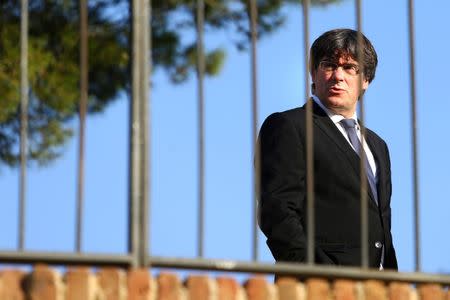 Catalan President Carles Puigdemont attends a memorial event at the tomb of former president of the Generalitat, the regional government, Lluis Companys in Barcelona, Spain, October 15, 2017. REUTERS/Ivan Alvarado