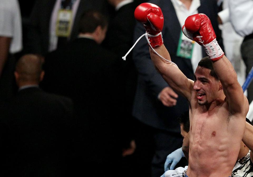 NEW YORK, NY - OCTOBER 20: Danny Garcia celebrates after knocking out Erik Morales in the fourth round of their WBA Super, WBC & Ring Magazine Super Lightweight title fight at the Barclays Center on October 20, 2012 in the Brooklyn borough of New York City. (Photo by Alex Trautwig/Getty Images)