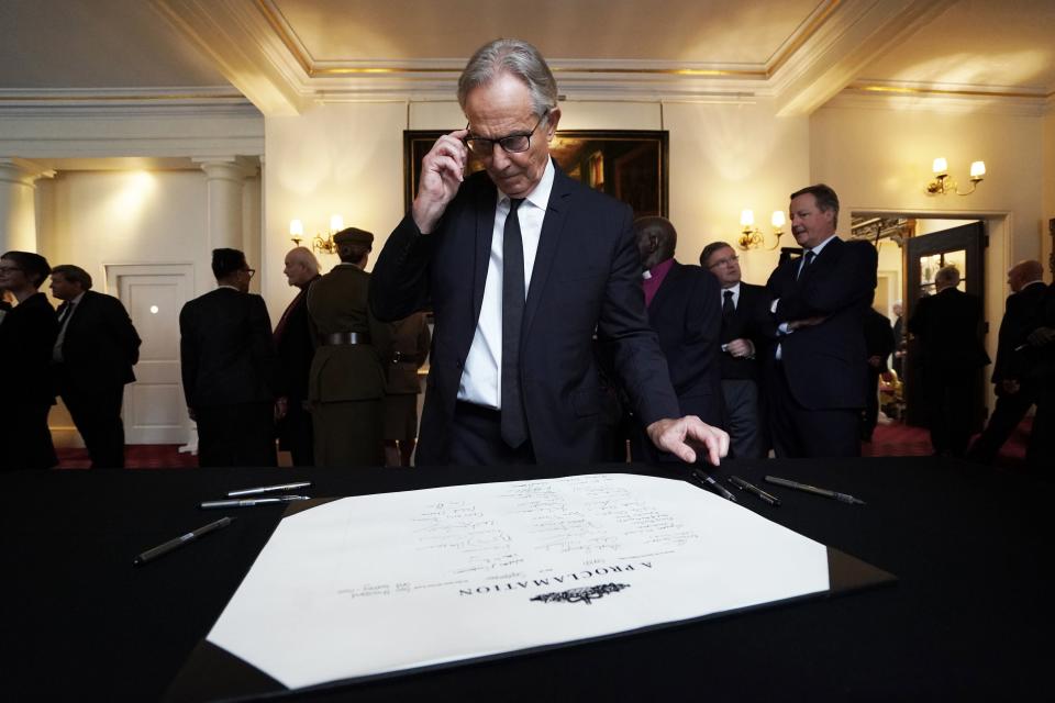 Former prime minister Sir Tony Blair signs the Proclamation of Accession of King Charles III following the Accession Council ceremony at St James’s Palace where King Charles III is formally proclaimed monarch on 10 September 2022 (Getty Images)