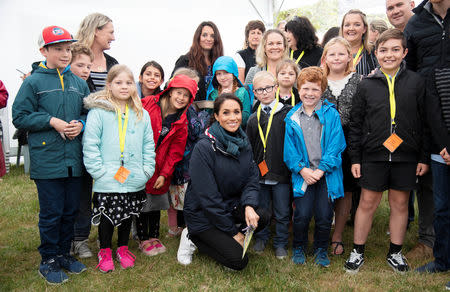 Britain's Meghan, Duchess of Sussex poses for a photo as she visits Abel Tasman National Park, which sits at the north-Eastern tip of the South Island, New Zealand to visit some of the conservation initiatives managed by the Department of Conservation, October 29, 2018. Paul Edwards/Pool via REUTERS