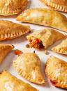 <p>Empanadas come in many different forms with many different fillings. This version is a flavor bomb, with tender <a href="https://www.delish.com/cooking/g2133/chicken-thighs/" rel="nofollow noopener" target="_blank" data-ylk="slk:chicken thighs;elm:context_link;itc:0;sec:content-canvas" class="link ">chicken thighs</a>, peppers, and olives, bolstered by tomato paste and <a href="https://www.delish.com/cooking/recipe-ideas/a37284371/what-is-paprika/" rel="nofollow noopener" target="_blank" data-ylk="slk:paprika;elm:context_link;itc:0;sec:content-canvas" class="link ">paprika</a>. Yum!</p><p>Get the <strong><a href="https://www.delish.com/cooking/recipe-ideas/a39750986/chicken-empanadas-recipe/" rel="nofollow noopener" target="_blank" data-ylk="slk:Chicken Empanadas recipe;elm:context_link;itc:0;sec:content-canvas" class="link ">Chicken Empanadas recipe</a></strong>.</p>