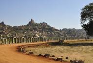 A market street, or what is also known as the courtesan’s street, leads to the Achyuta Raya temple. The ruins add to the serenity of the place. Also, the street and the temple are hidden snug behind Matanga hill and attract fewer tourists than the rest of the temples.<br>