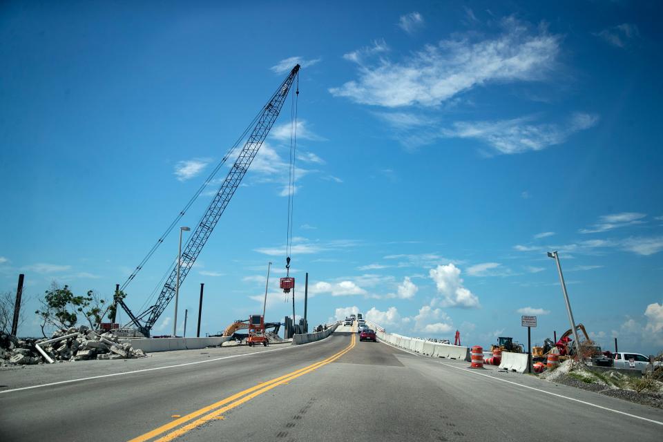 Crews work on repairs and improvements on the Sanibel Causeway on Monday, Sept. 18, 2023.