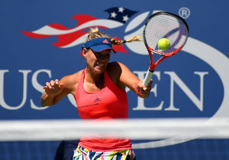Aug 29, 2016; New York, NY, USA; Angelique Kerber of Germany hits to Polona Hercog of Slovenia on day one of the 2016 U.S. Open tennis tournament at USTA Billie Jean King National Tennis Center. Robert Deutsch-USA TODAY Sports