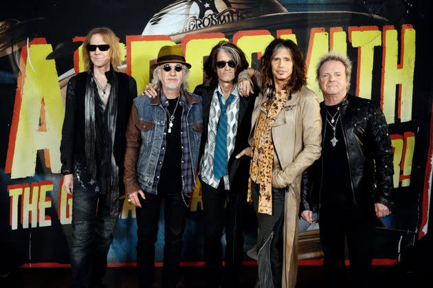 Tom Hamilton, Brad Whitford, Joe Perry, Steven Tyler and Joey Kramer of Aerosmith pose at the press junket to announce their new album 