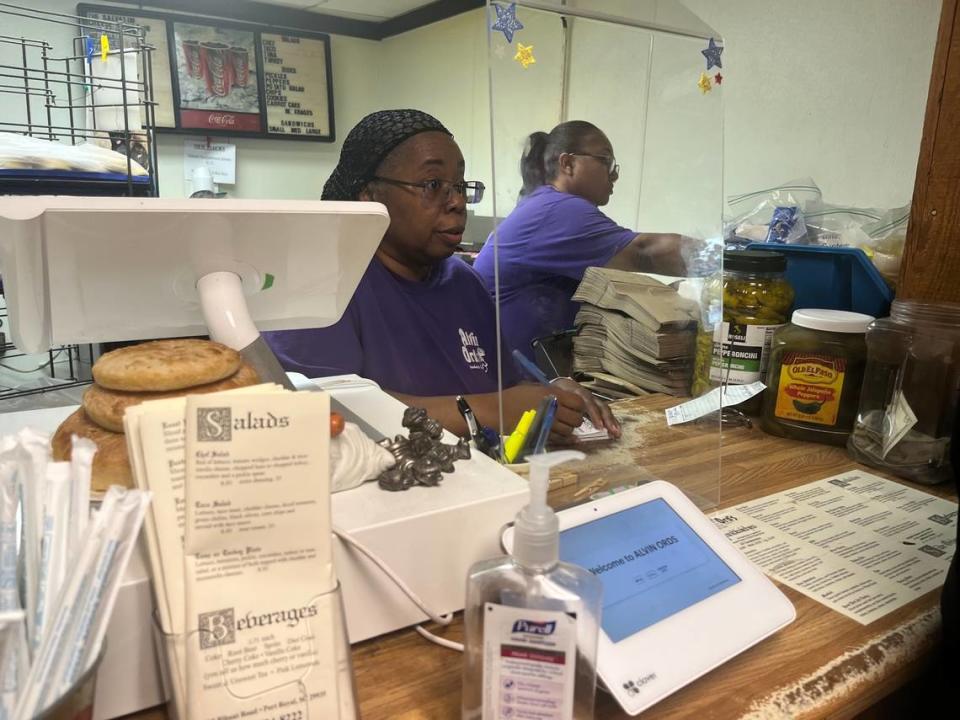 Ronette Grant takes an order Friday morning at Alvin Ord’s Sandwhich Shop in Port Royal. Grant, a 33-year employee, is just one of several employees who have worked at the shop for decades.