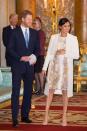 <p>Harry shares a laugh with Meghan as they attend a reception to mark the 50th anniversary of the investiture of the Prince of Wales at Buckingham Palace.</p>