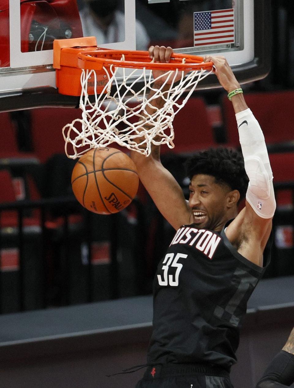 Christian Wood #35 of the Houston Rockets dunks against the Portland Trail Blazers during the fourth quarter during the fourth quarter at Moda Center on December 26, 2020 in Portland, Oregon. (Photo by Steph Chambers/Getty Images)