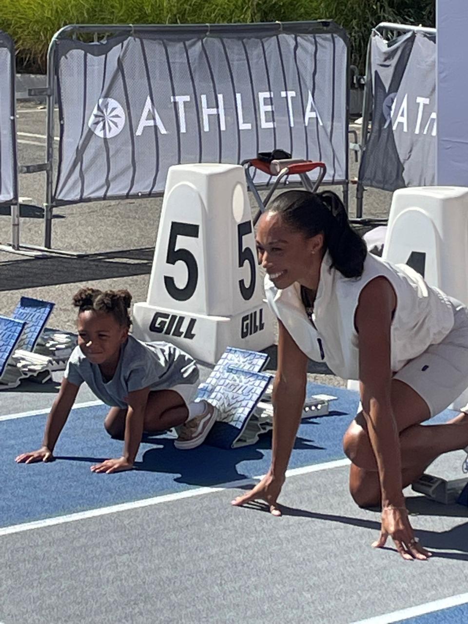 Allyson Felix and her 3-year-old daughter, Cammy, on Sunday.