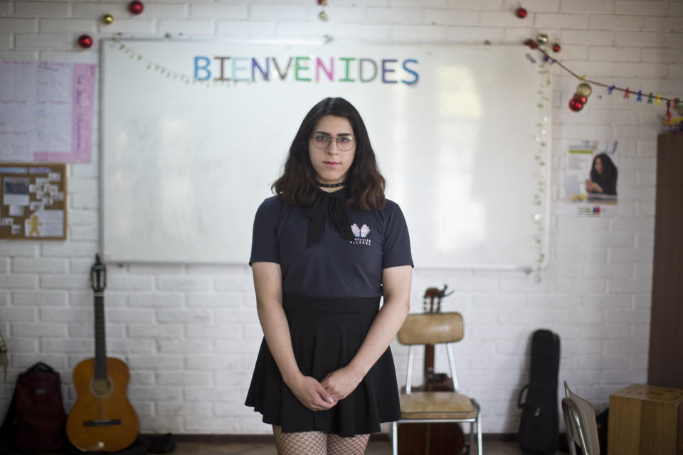 In this Dec.14, 2018 photo, Angela, a transgender girl, poses for a photo at the Amaranta Gomez school in Santiago, Chile. Students at the school are assigned to one of two classrooms based on age. (AP Photo/Esteban Felix)