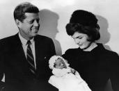 <p>President-elect John F Kennedy with his wife Jacqueline, at the christening of their son John Fitzgerald Kennedy junior. </p>