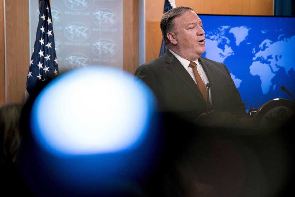 Secretary of State Mike Pompeo speaks at a news conference in the press briefing room at the State Department in Washington, Friday, Sept. 14, 2018, in Washington. Pompeo says his Obama-era predecessor John Kerry has been 'actively undermining' U.S. policy on Iran. (AP Photo/Andrew Harnik)