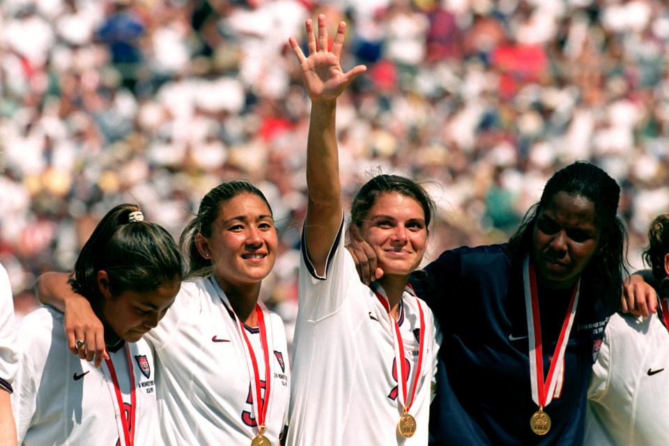 (l-r) USA's Lorrie Fair, Tiffany Roberts, Mia Hamm and Briana Scurry celebrate winning the World Cup  (Photo by Jon Buckle/EMPICS via Getty Images)