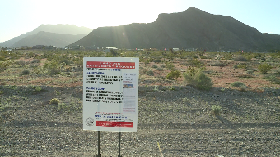 A public notice sign sits at the potential site of an LDS temple. (KLAS)