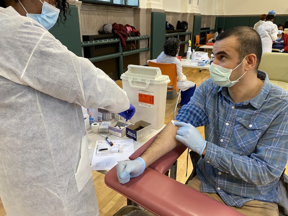 NEW YORK, USA - MAY 15: A man getting his coronavirus antibody testing at the NYPD Community Center in Brooklyn, New York, United States on May 15, 2020. Bio Reference Laboratories OPKO Health Co. is providing coronavirus antibody testing at several places in New York City amid Covid-19 pandemic. (Photo by Tayfun Coskun/Anadolu Agency via Getty Images)