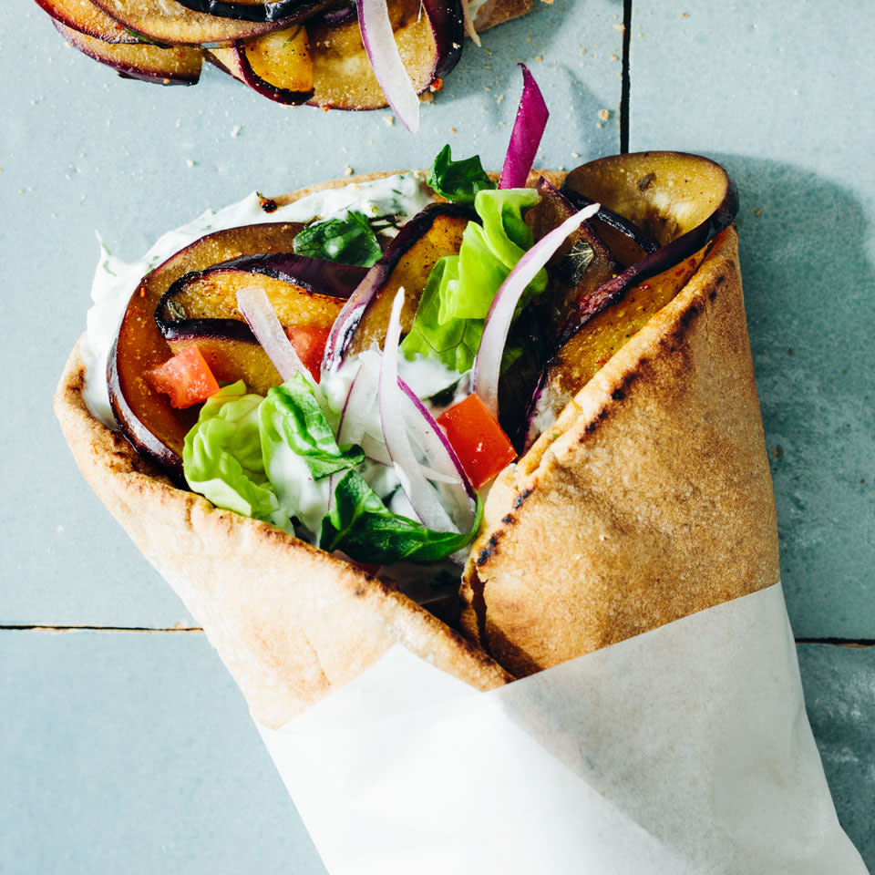 <p>Eggplant's meaty texture is a delicious vegetarian stand-in for the lamb that typically fills a gyro sandwich. The vegetable absorbs the lemony-herby-spicy marinade like a sponge, so if you have time, let it marinate for the full day. <a href="https://www.eatingwell.com/recipe/263917/eggplant-gyros/" rel="nofollow noopener" target="_blank" data-ylk="slk:View Recipe" class="link ">View Recipe</a></p>