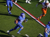 Air Force wide receiver Brandon Lewis carries the ball as Boise State linebacker Brock Miller pursues during the first half of an NCAA college football game Saturday Oct. 31, 2020, at Air Force Academy, Colo. (AP Photo/David Zalubowski)