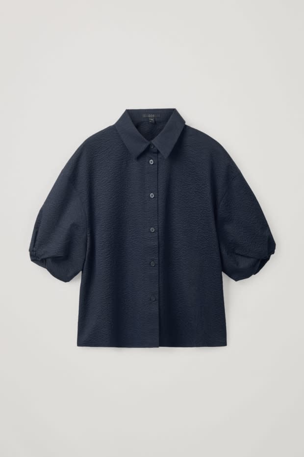 <p>Cos Cotton Puff Sleeve Seersucker Shirt, $99, <a href="https://rstyle.me/+NWDrPDBlS_U1oYhYSuFVdQ" rel="nofollow noopener" target="_blank" data-ylk="slk:available here;elm:context_link;itc:0;sec:content-canvas" class="link ">available here</a>.</p>