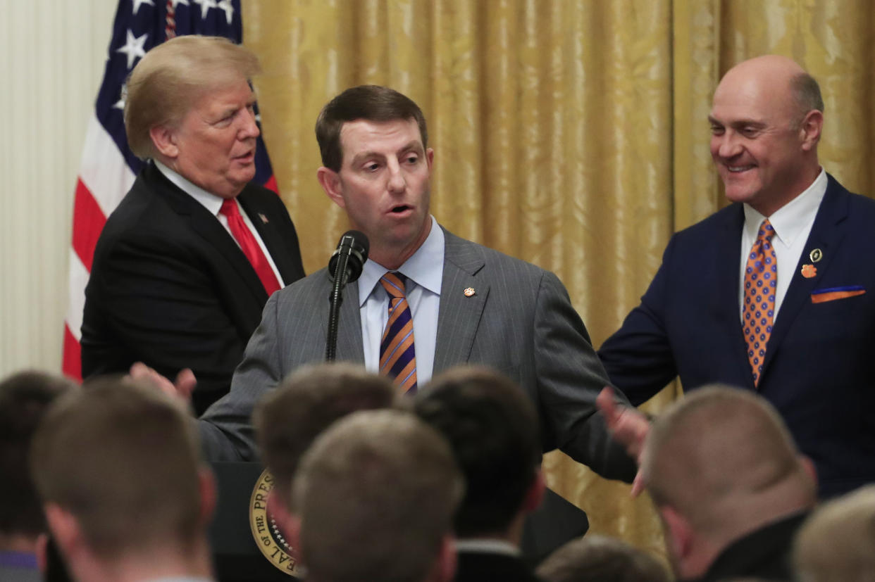 Clemson coach Dabo Swinney speaks as President Donald Trump shakes hands with Clemson President James Clements during a ceremony welcoming the college football national champions to the White House. (AP Photo/Manuel Balce Ceneta)