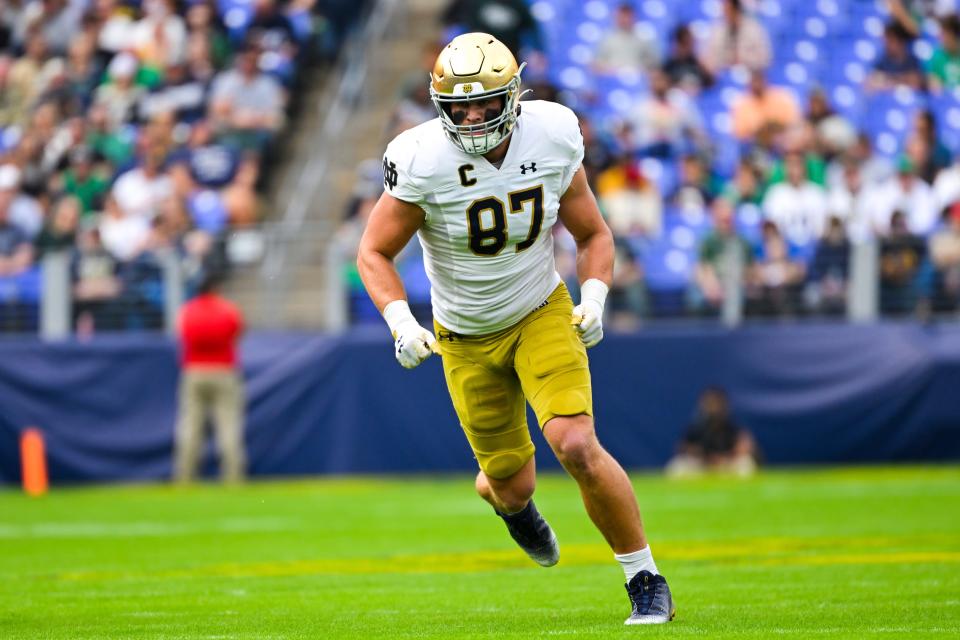 Notre Dame tight end Michael Mayer (87) in action during the first half of an NCAA college football game against Navy, Saturday, Nov. 12, 2022, in Baltimore. (AP Photo/Terrance Williams)