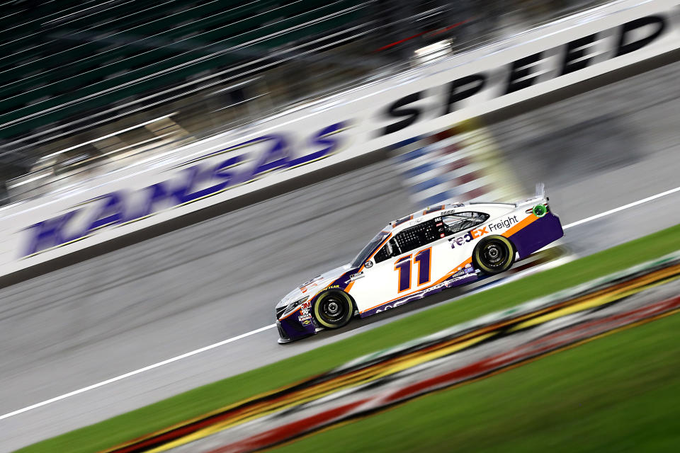 KANSAS CITY, KANSAS - JULY 23: Denny Hamlin, driver of the #11 FedEx Office Toyota, races during the NASCAR Cup Series Super Start Batteries 400 Presented by O'Reilly Auto Parts at Kansas Speedway on July 23, 2020 in Kansas City, Kansas. (Photo by Jamie Squire/Getty Images)