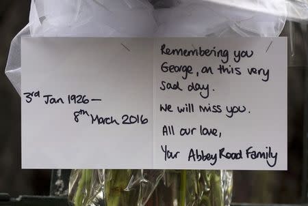 A floral tribute to producer George Martin from the Abbey Road recording studio is displayed outside the studio building in London, Britain March 9, 2016. REUTERS/Neil Hall