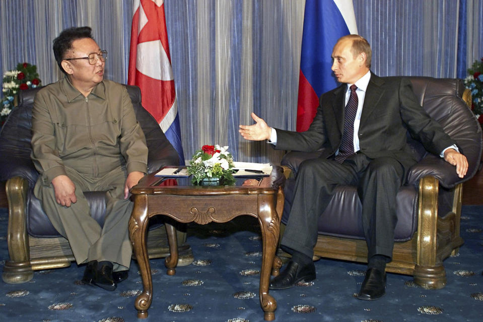 FILE - In this Aug. 23, 2002 file photo, Russian President Vladimir Putin, right, gestures as he talks to North Korean then leader Kim Jong Il during their meeting in Vladivostok. North Korean leader Kim Jong Un’s meeting with Russian President Vladimir Putin gives an intriguing twist to the global diplomatic push to resolve the nuclear standoff with North Korea, which appeared to hit a wall after a summit between Kim and President Donald Trump collapsed in February. (AP Photo/Alexander Zemlianichenko, File)