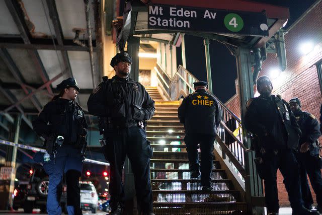<p>AP Photo/Eduardo Munoz Alvarez</p> NYPD officers stand guard stand guard outside station