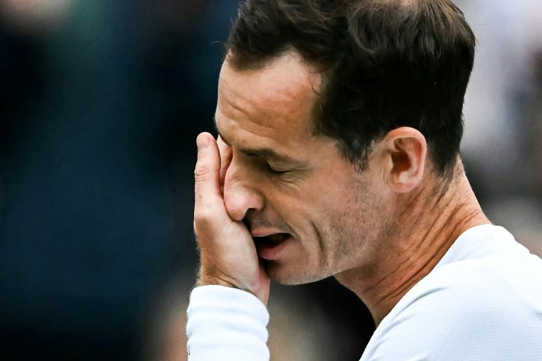 'Wish I could play forever': Andy Murray cries as he delivers a speech at the end of his doubles match (Ben Stansall)