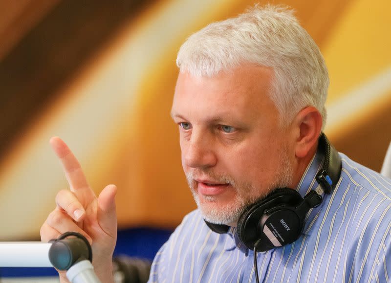 FILE PHOTO: Journalist Sheremet talks on air at radio station in Kiev